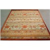 Wool and silk tufted carpets