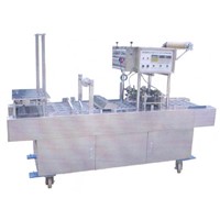 Cup filling and sealing machine