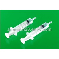 Fluid feeding syringes