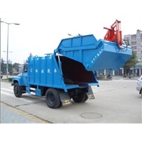 Compressing Garbage Truck