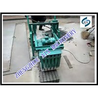 Cement brick making machine