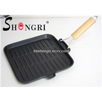 cast iron frying pan with folding wooden handle