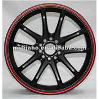 14 inch black wheel rim with red machine lip