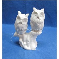 Porcelain Owl Figurines Perched on Stand