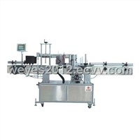 Round flat bottle labeling machine