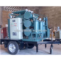 Mobile trailer type transformer oil reclaiming system degassing, drying and particulate removal