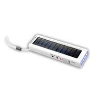 Solar torch with radio and charger