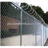 Chain Link Fabric with Barbed Wire on Top