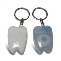 Tooth shape dental floss in blister card