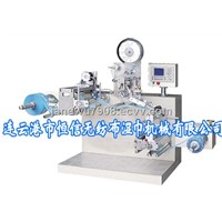 Automatic packing film labeling and rewinding machine