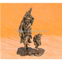 Traditional handmade wood sculpture with fisherman