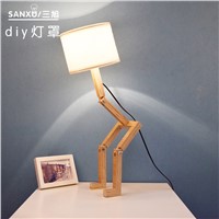 New creative small machine humanoid table lamp wooden table lamp for bedroom wood desk lamp