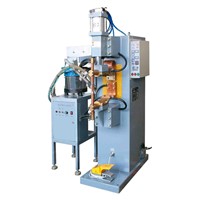 Nuts Automatic feeding system with spot welder