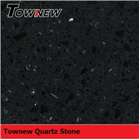 Black with specks of mirror and glasses quartz surface countertop sample