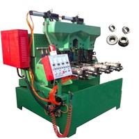 The pneumatic 4 spindle flange & hex nut tapping machine