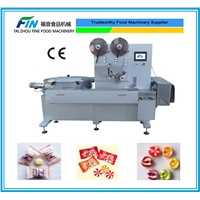Automatic pillow type candy packaging machine