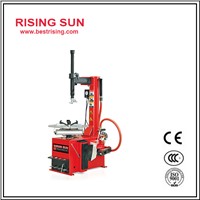 Semi automatic tire changing machine with swing arm