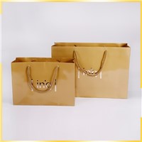 Factory Price Luxury Customized Gold Hot Stamping Shopping Wedding Gift Paper Bag by China Manufactures