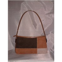 PVC patched leather handbag