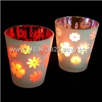 GLASS CANDLE HOLDER WITH HOLLOWING PATTERN