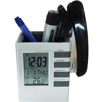 Digital clock with penholder