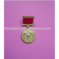 brass pin badge