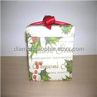 beautiful paper gift box with red ribbon