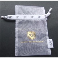 Custom white organza jewelry pouch with golden hot stamping logo in center