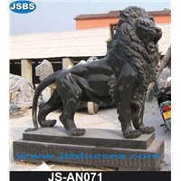 Carved stone lion sculpture