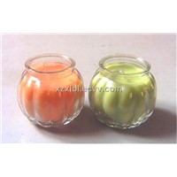Glass candle holder in pumkin shape