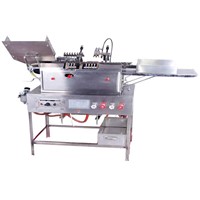 Ampoule drawing filling and sealing machine