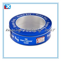 small round tin container/ biscuit can