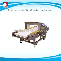 Automatic metal detector for food processing industry