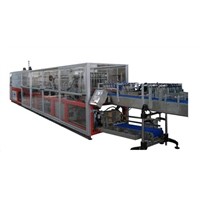 Continuous tray packer