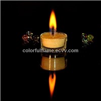 Colored flame candle with glass holder