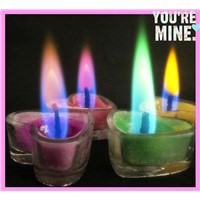 Colored flame tea light candle with heart shape