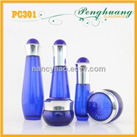 Blue cosmetic glass bottles and jars