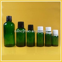 Green essential oil glass bottle