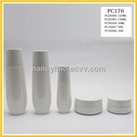 White plastic cap cosmetic glass bottle