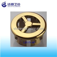 Lavatory hole cover in gold