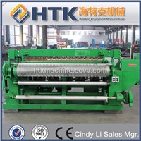 Automatic welded wire mesh fence roll machine