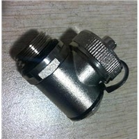 Charge/discharge adjustable valve with plug