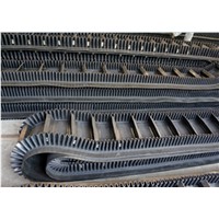 Corrugated sidewall oil resistant conveyor belt