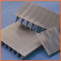 Sloped plate coalescers