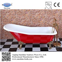 red vintage enamelled cast iron bath tub with claw feet