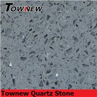 Grey with specks of mirror and glasses quartz suface countertop sample