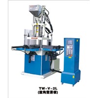 Vertical plastic injection molding machine with right angle double slide