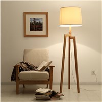 Three-legged writing/reading wooden floor lamp