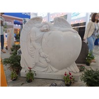 White marble angel with heart  headstones