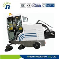 street discharging sweeping car